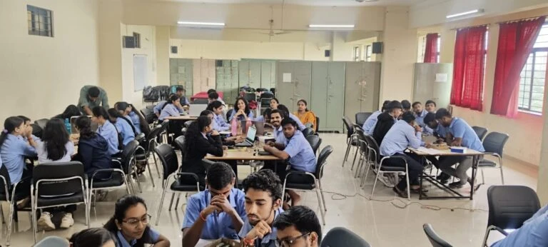 Faculty mentoring students during workshop