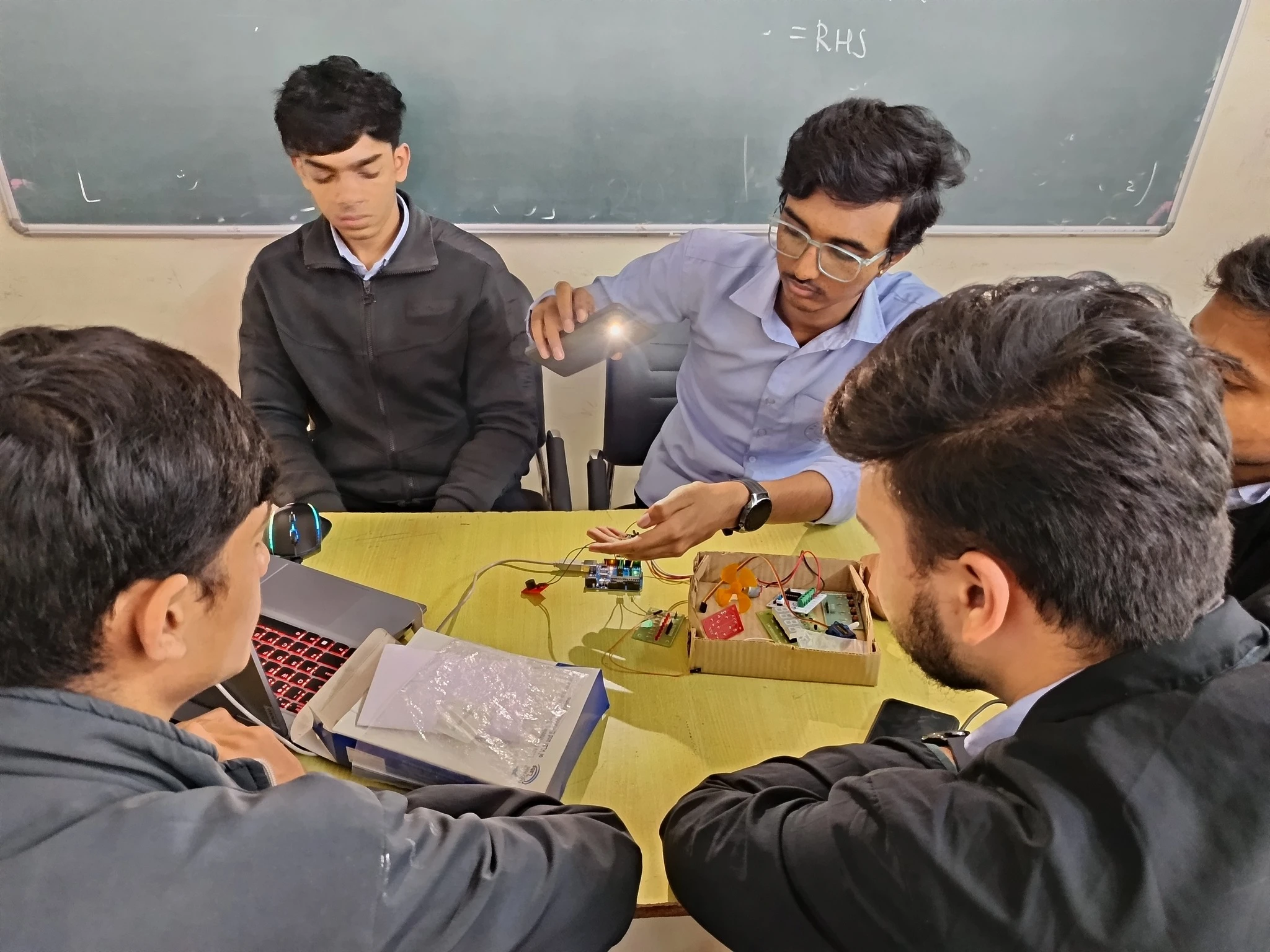Students performing IoT experiments